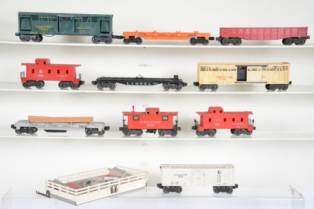Lionel Rolling Stock: Includes 3366 Circus car with corral. Car has yellowed, corral has melt marks from horses, railings intact; 6472 Reefer; 3361 log dump car; 3356 horse car; 6362-55 empty flat; 6462 gondola; 6257 caboo