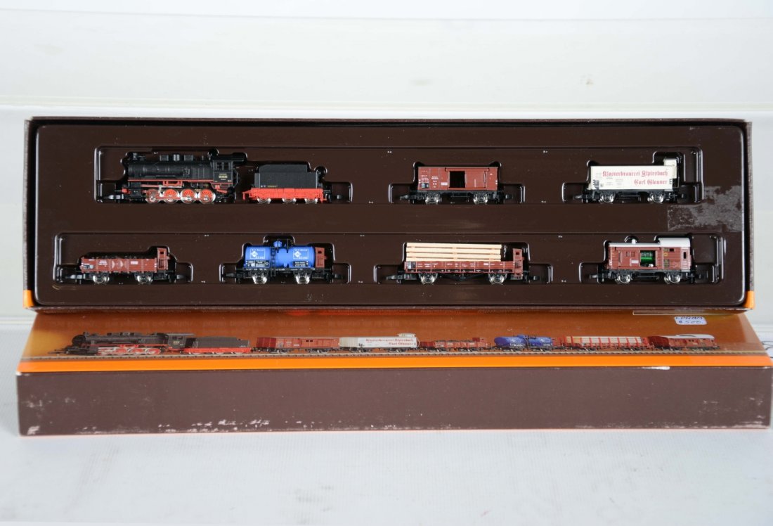 Marklin Z Gauge 81415 Steam Freight Set: Includes an 0-8-0 DB steam loco & tender with 6 assorted freight cars. The set is new in box, C10