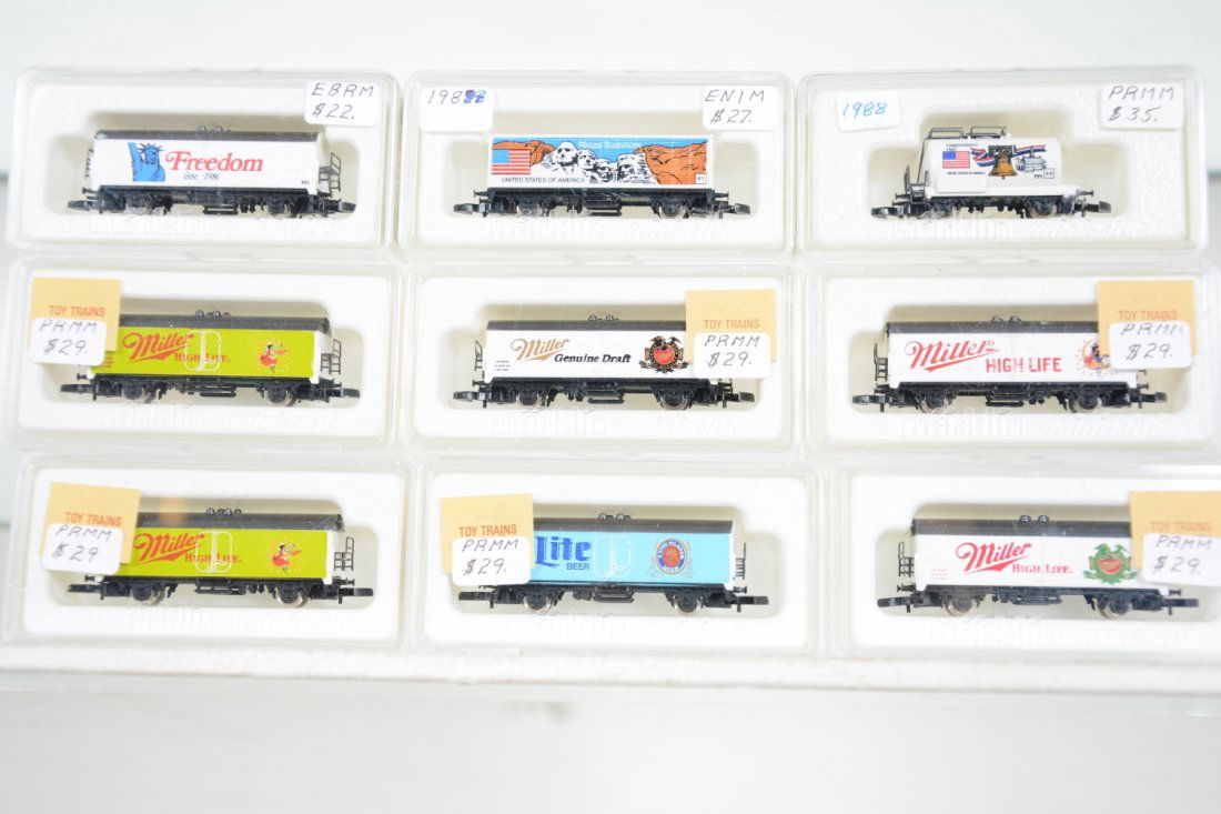 Marklin Z Gauge American Motif Cars: Includes Miller Beer car- b2401M, 2403M, 2402M, 2404M, 2 #2405M; 1986 Freedom reefer; 82553 USA container car; 82509 Independence tank car. All appear new in boxes, C10