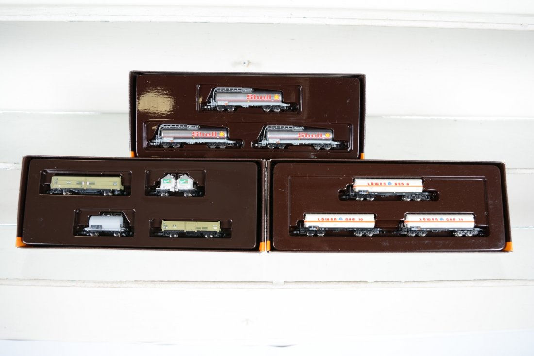 Marklin Z Gauge Freight Car Assortments: Includes 82201 3-car Shell tanks; 8616 Lowen Gas cars 3-pack; 82509 Persil 4-car set. All are new in boxes, C10