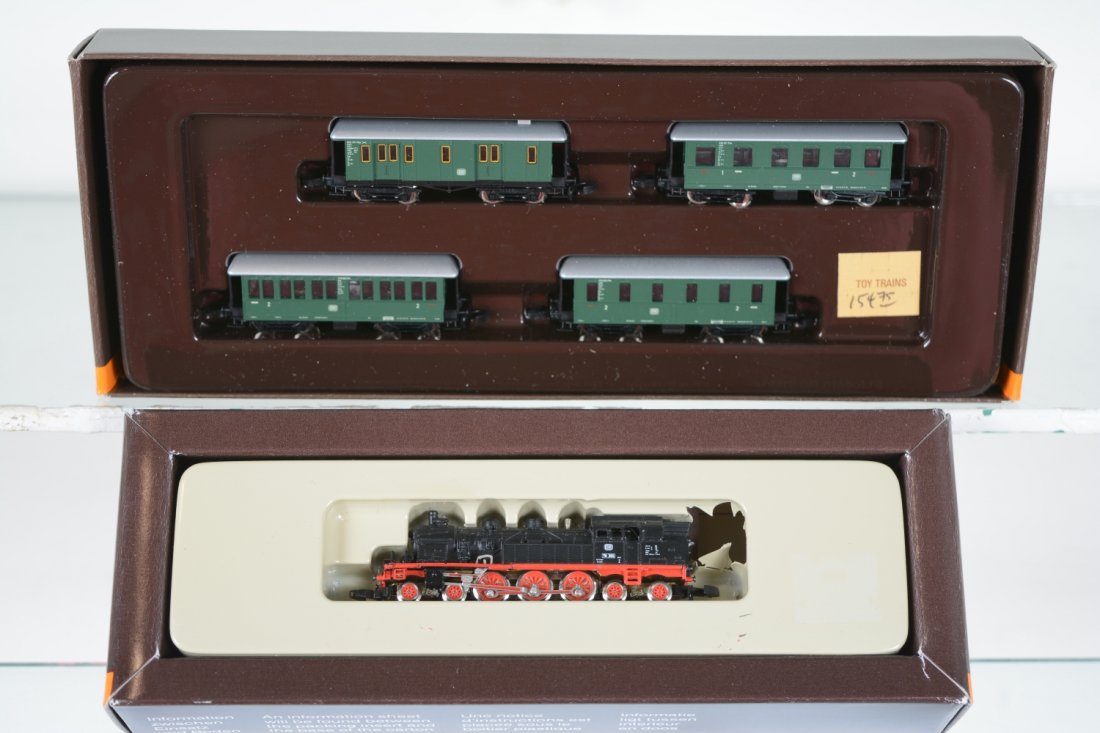 Marklin Z Gauge Steam Passenger Set: Includes an 8806 4-6-4 DB tank loco; 8768 4-car passenger set. All are new in box, C10