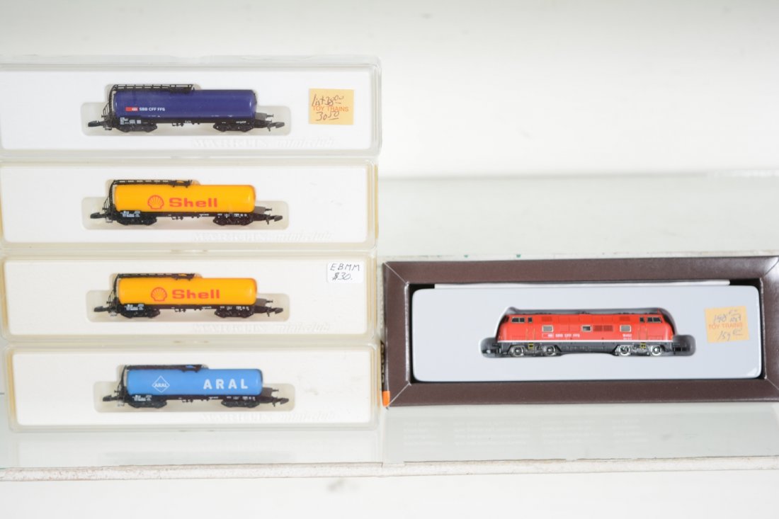 Marklin Z Gauge Swiss Tank Car Train: Includes an 88333 SBB CFF FFS BO-BO diesel loco; 2 #8625 Shell tank cars; 8627 Aral tank; 8220 Swiss tank. All are new in boxes, C10