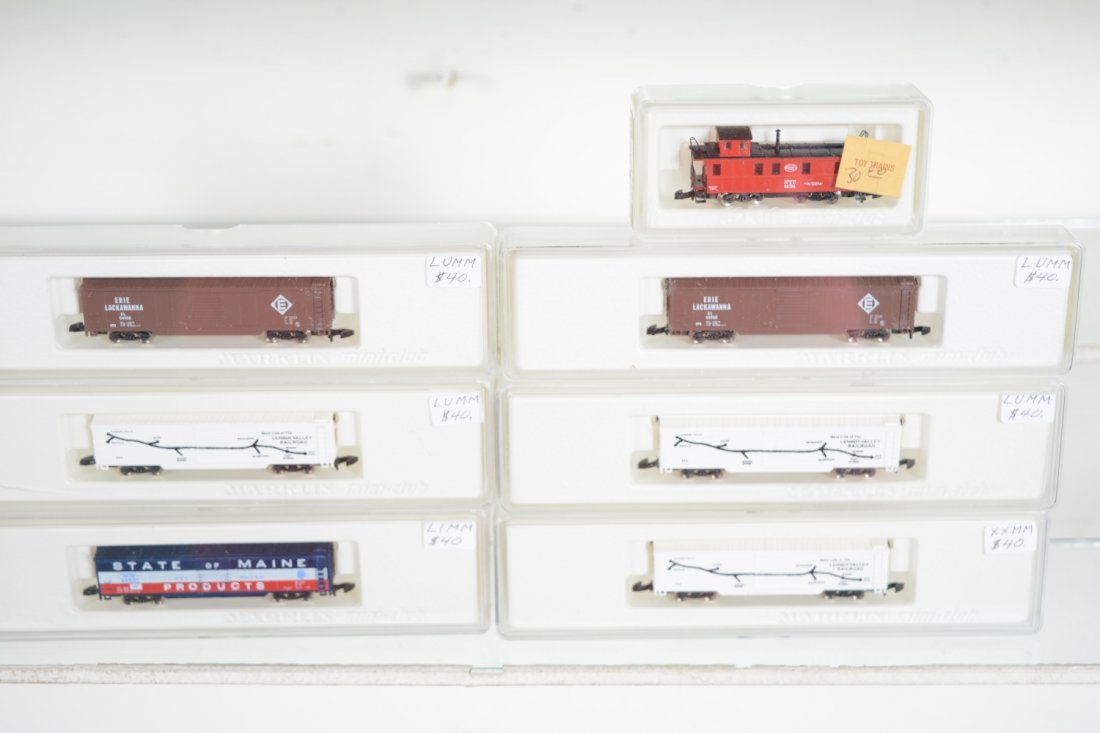 Marklin Z Gauge American Freight Cars: Includes 2 #8672 Erie Lackawanna boxcars; 3 #88672A LV Map boxcars; 88673A SOM boxcar; 8680 NYC caboose. All are new in boxes, C10