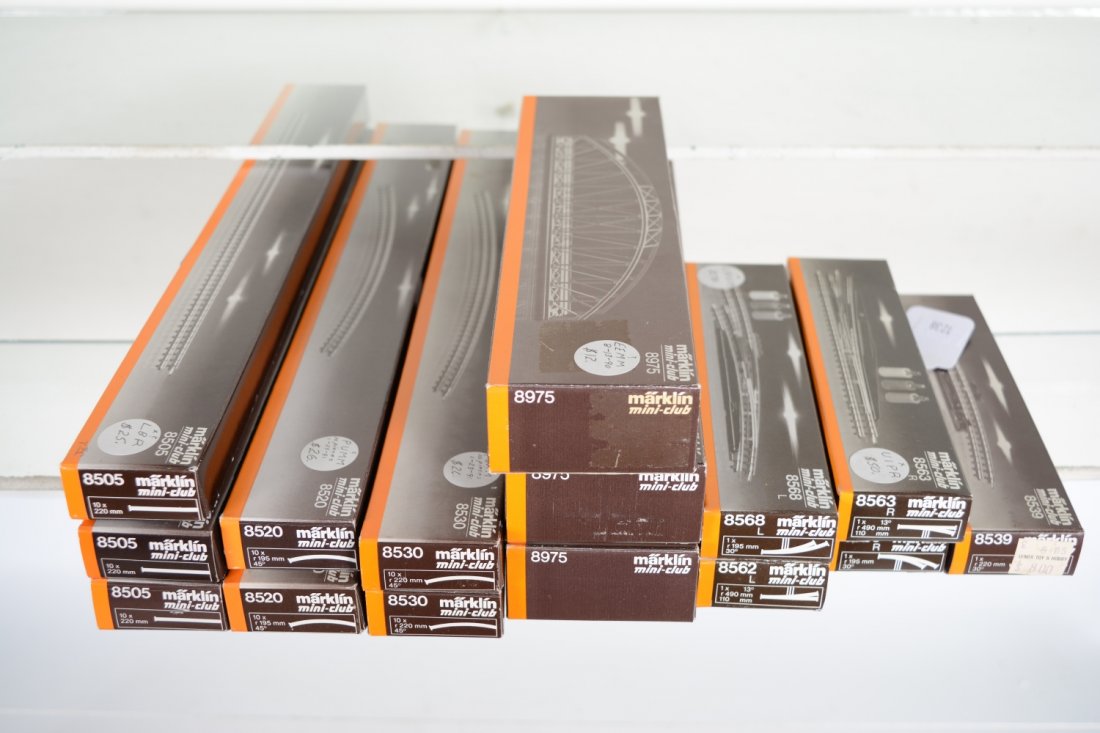 Marklin Z Gauge Track & Switches: Includes 2 #8530 curve track; 3 #8505 straight track; 2 #8520 curve track; 3 #8975 trestle bridges; 8539 activator track; 8562 LH remote switch; 8563 LH remote switch; 8568 LH curve remote switch; 856
