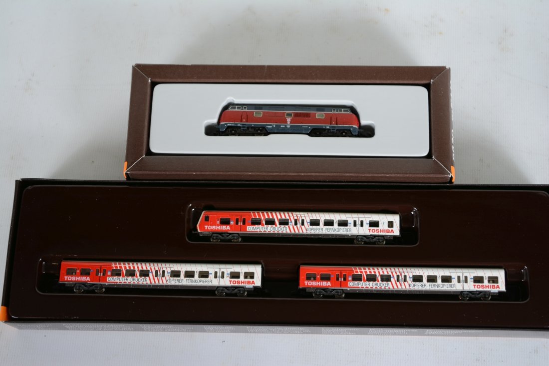 Marklin Z Gauge DB Diesel Passenger Set: Includes an 8820 BO-BO diesel; 8783 3-car Toshiba passenger car set. All are new in boxes, C10