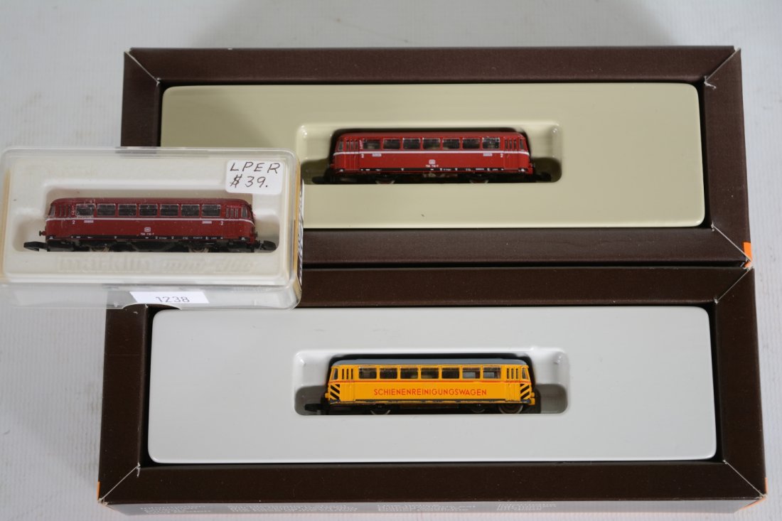 Marklin Z Gauge Rail Cars: Includes 8816 DB power car; 8817 DB trail car; 8802 Schienreingungswagen. All are new in boxes, 8802 has price tag tear, C10