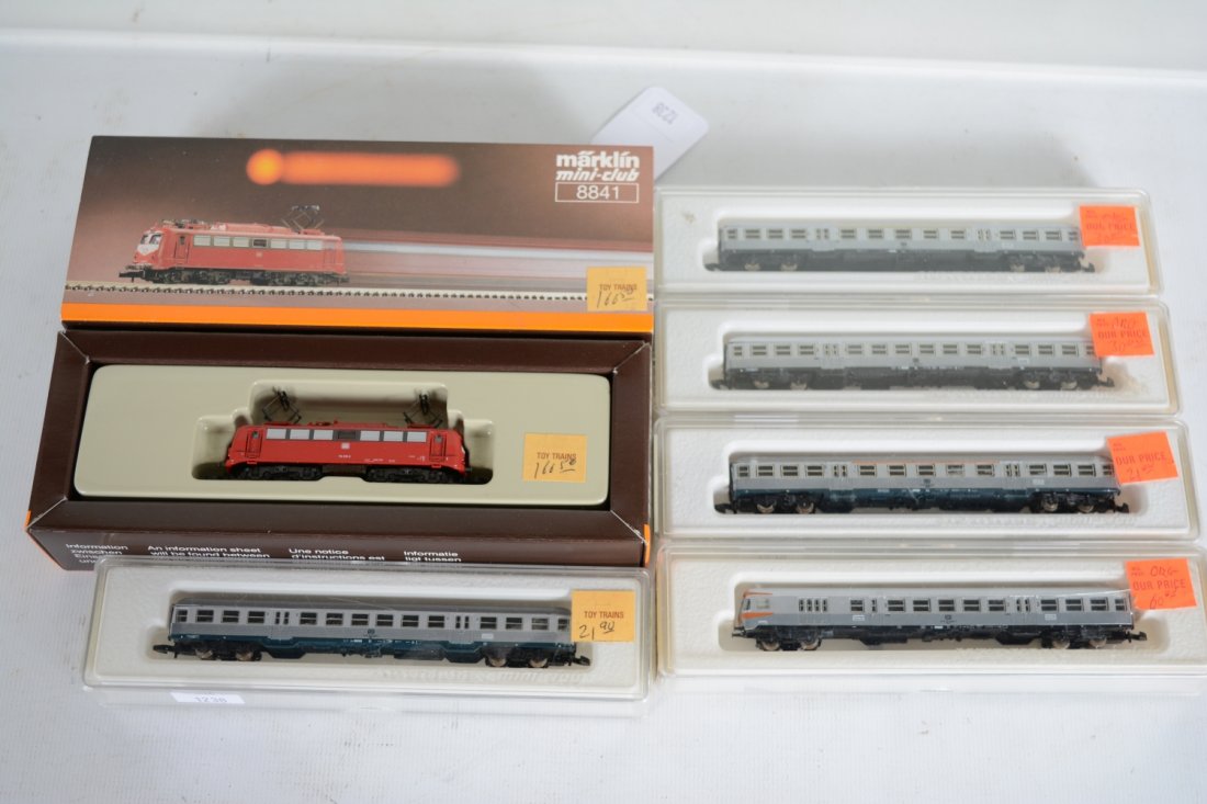 Marklin Z Gauge Diesel Commuter Train: Includes an 8841 BO-BO electric loco; 2 #8716 2nd class coaches; 2 #8717 1st class coaches; 8718 restaurant car with tail lights. All are new in boxes, C10