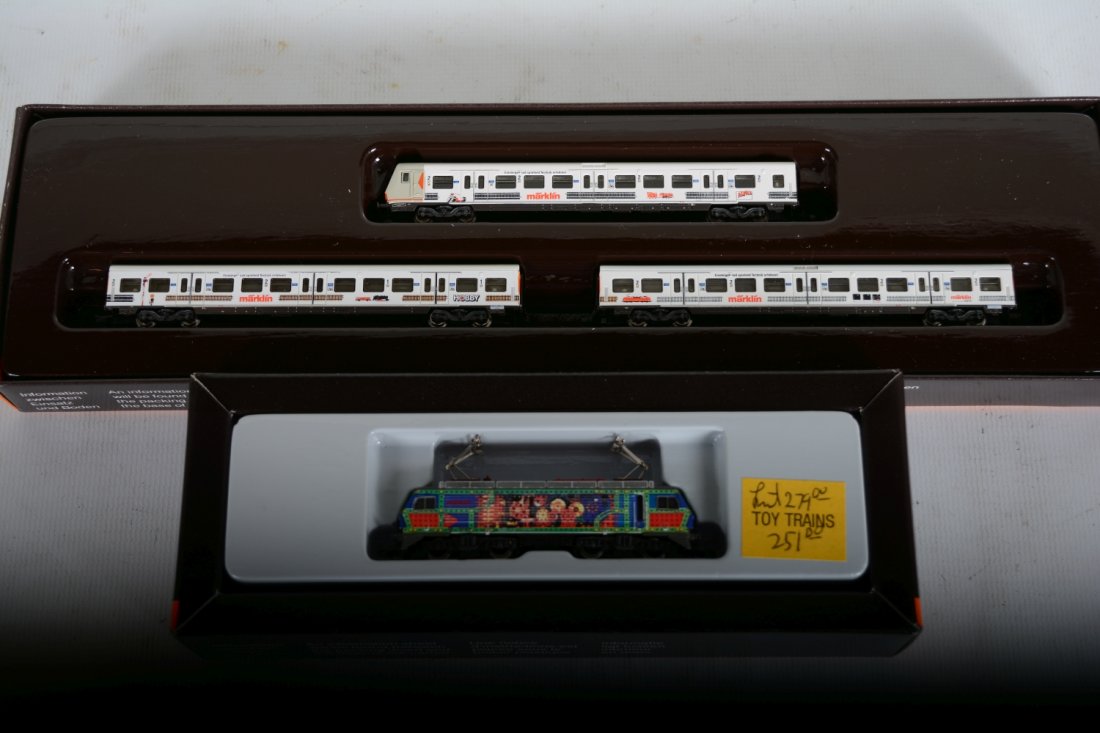 Marklin Z Gauge Passenger Set: Includes an 88472 Marklin Constructor BO-BO electric with 8779 3-car Marklin commuter car set with trail car having electric lights. All are new in boxes, C10