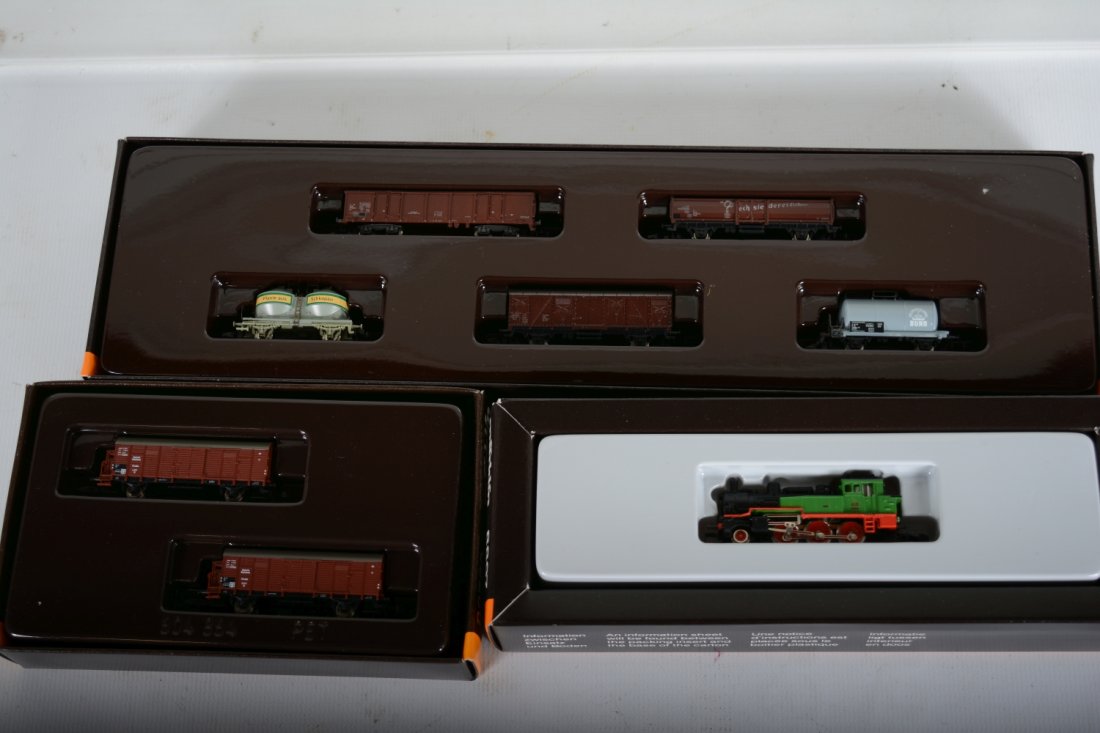 Marklin Z Gauge Steam Freight Set: Includes an 8897 2-6-0 tank loco; 82560 2-car goods wagon set; 8204 5-car freight assortment. All are new in boxes, C10