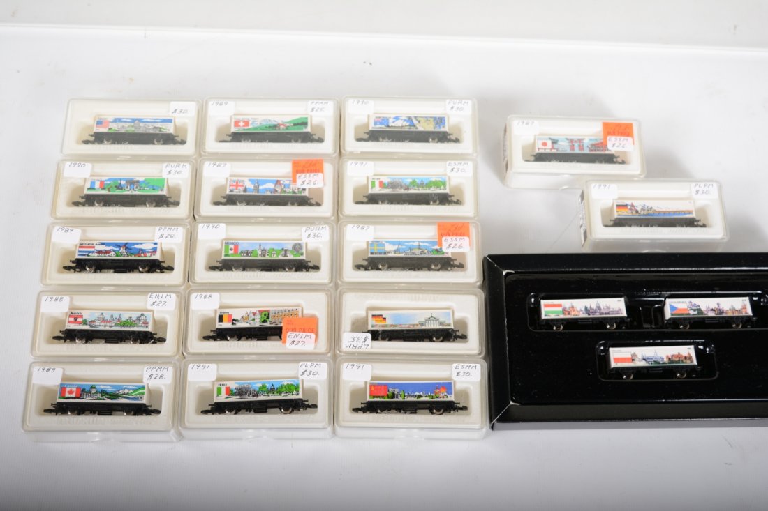 Marklin Z Gauge Nations of the Word Cars: Includes 2511A, 82516, 82515A, 2521A, 82515A, 2550, 2516A, 2552, 2513A, 2510A, 82555, 82554, 2558A, 2514A, 2512A, 2551, USA, 88126A 3-car set. All appear new in boxes, C10
