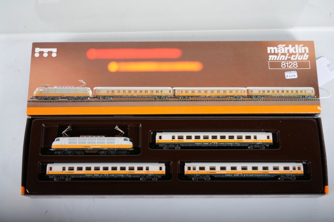 Marklin Z Gauge 8128 Lufthansa Airport Express: Includes a 0-6-6-0 electric with 3 matching passenger cars. All appear new in setbox, C10