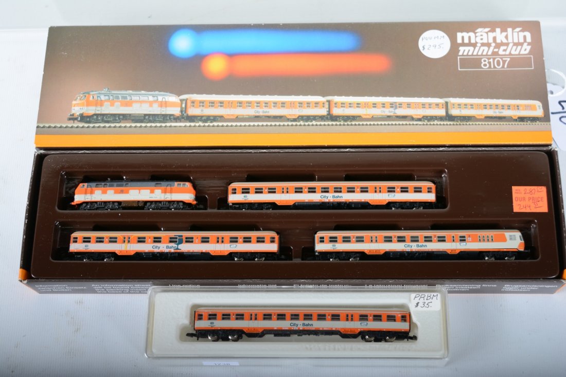 Marklin Z Gauge 8107 City Bahn Set: Includes the 8107 set with BO-BO diesel, 2 coaches & postal car; plus a 8702 extension coach. All are new in boxes, C10