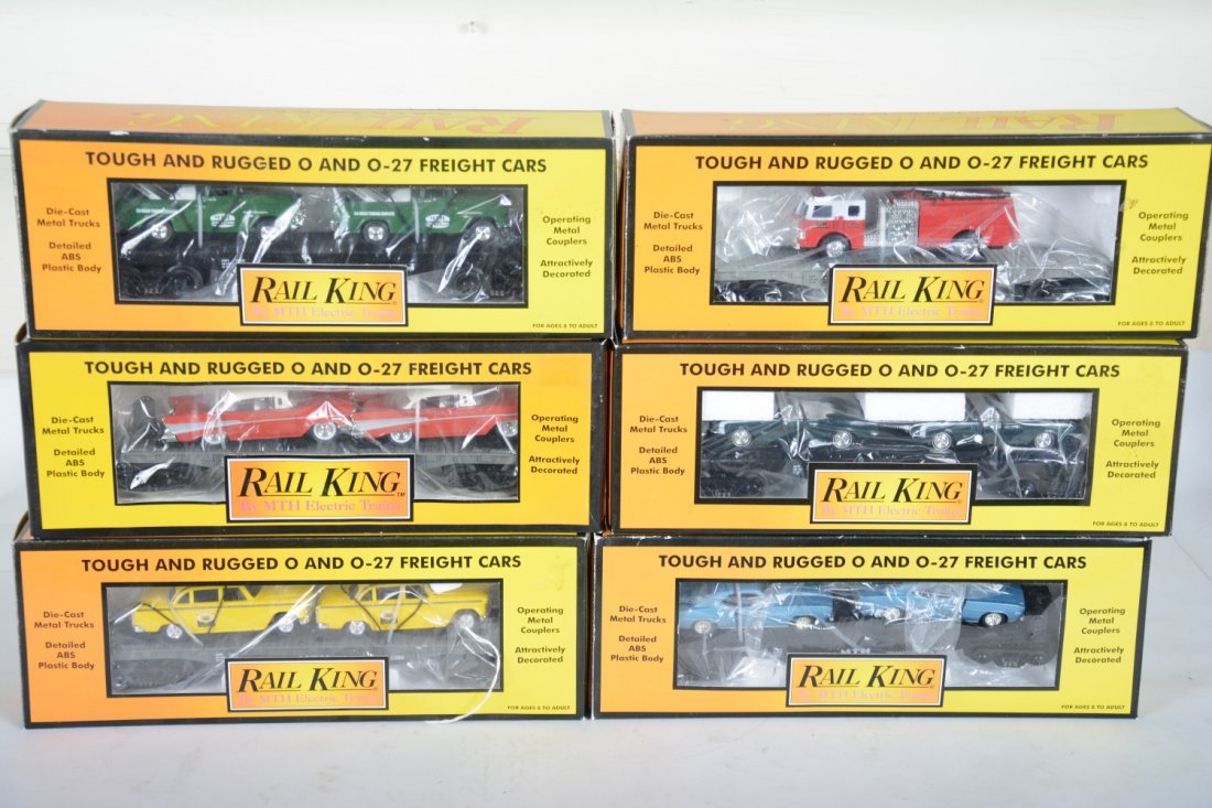 MTH RailKing Auto-Loaders: Includes 30-7625 flat with taxis; 30-7634 flat with Cameros; 30-7610 flat with Chevys; 30-7670 flat with Cameros; 30-7615 flat with wrecker; 30-7629 flat with fire truck. All appear new in boxes, C10