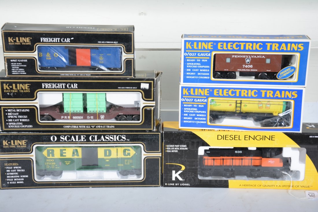 K-Line Diesel Freight Set: Includes a 21221 MR Switcher with horn; K761-1931 Reading boxcar; 665501 flat with transformers; 5120 B&O boxcar; 91651 Sunny Delight tank; 7406 PRR smoke caboose. Some show light runtime all with C9 