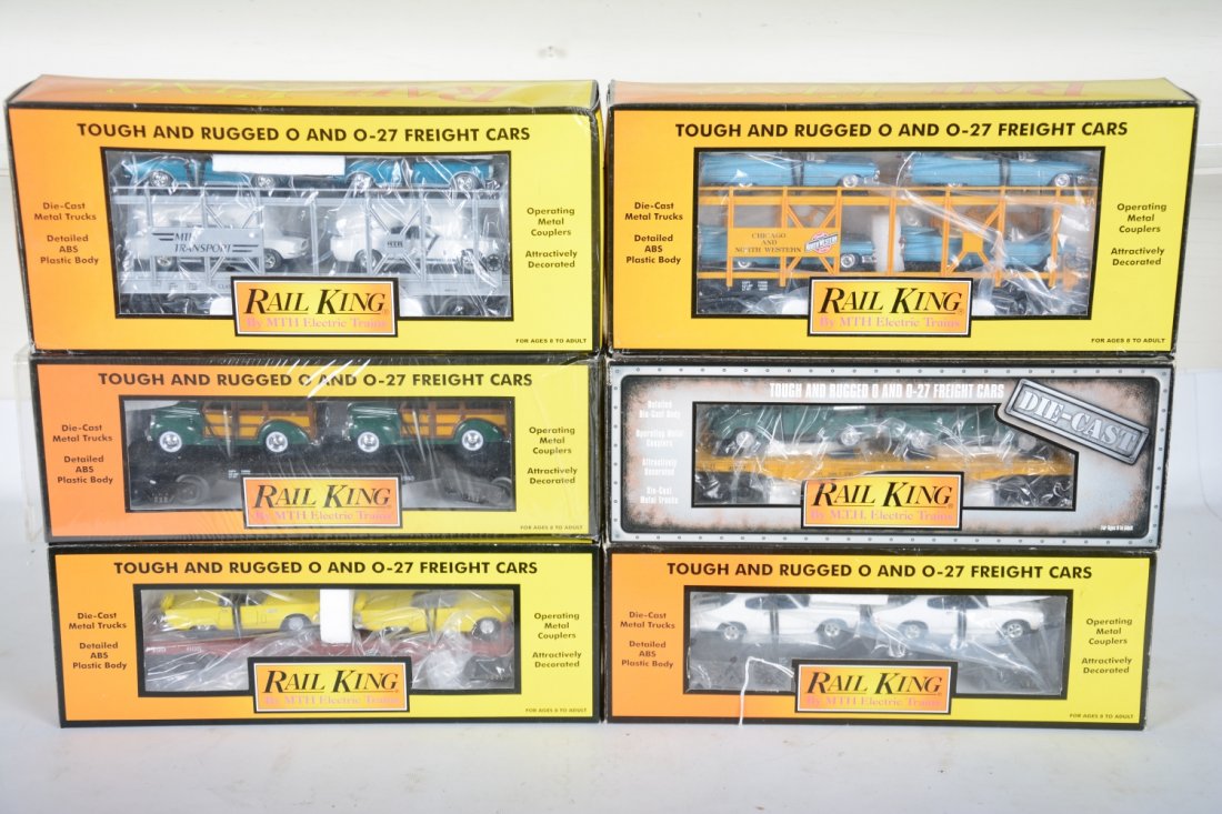 MTH RailKing Auto-Loaders: Includes 30-7666 with Cameros & Shelby's; 30-76139 with Cadillacs; 30-76119 with T-Birds; 30-7680 with Chevelles; 30-7662 with Woodys; 30-6312 cast flat with Ford Pick-ups. All appear new in boxes, C1