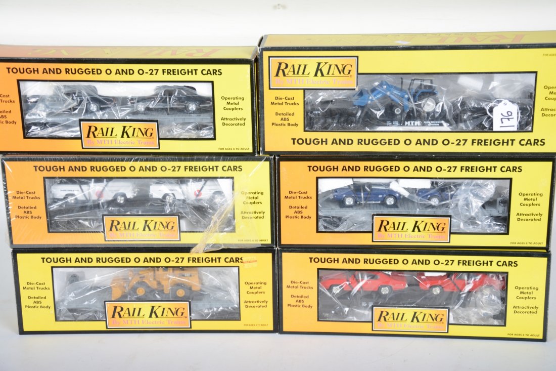 MTH RailKing Freight Cars: Includes auto-loaders- 30-7660 with Cobras; 30-7661 with Novas; 30-7640 with tow trucks; 30-7639 with GTOs; 30-7622 flat with tractor; 30-7619 flat with loader. All appear new in boxes, C10