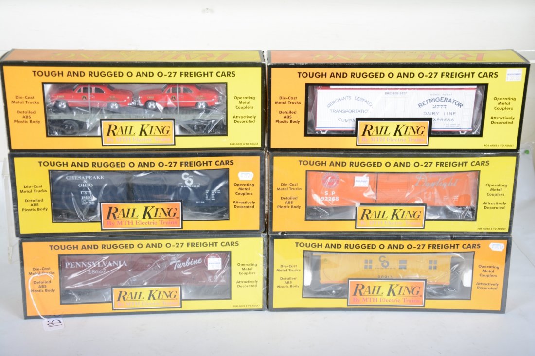 MTH RailKing Freight Cars: Includes 30-7437 PRR boxcar; 30-7441 SP boxcar; 30-7623 flat with fire cars; 7709 C&O caboose; 30-7411 C&O boxcar; 30-7867 MDT reefer. All appear new in boxes, C10