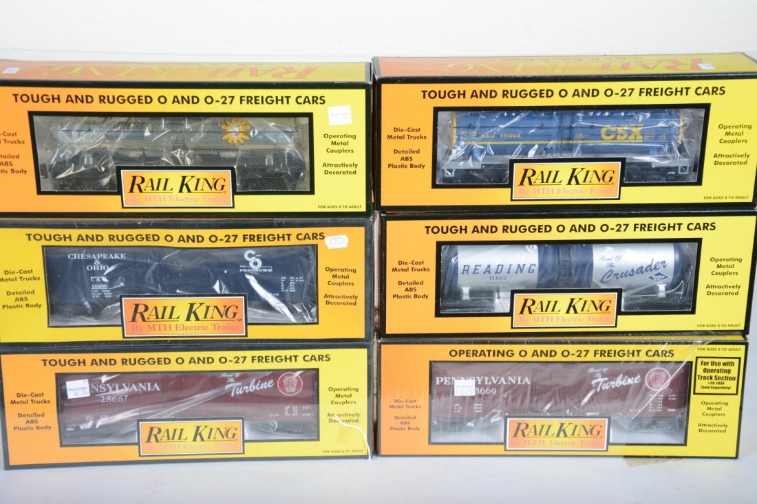 MTH RailKing Freight Cars: Includes 30-7465 & 7437 PRR boxcars; 30-73177 Reading boxcar; 30-7411 C&O boxcar; 30-7376 Borden's tank; 30-73106 CSX tank. All appear new in boxes, C10