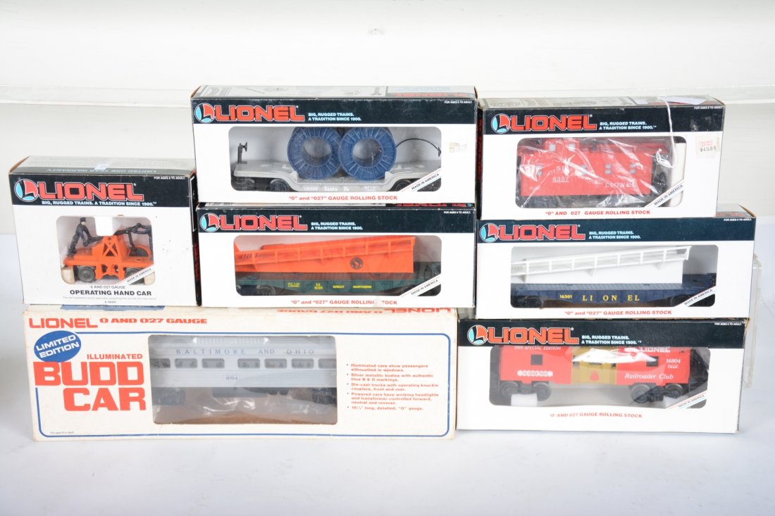 Lionel Lot: Includes a 8765 Budd baggage non powered; 18401 handcar; 16804 LRRC caboose; 16326 flat with reels; 16320 & 301 barrel ramp cars; 6357 caboose, box graffiti. All show very light runtime with C9 bodies