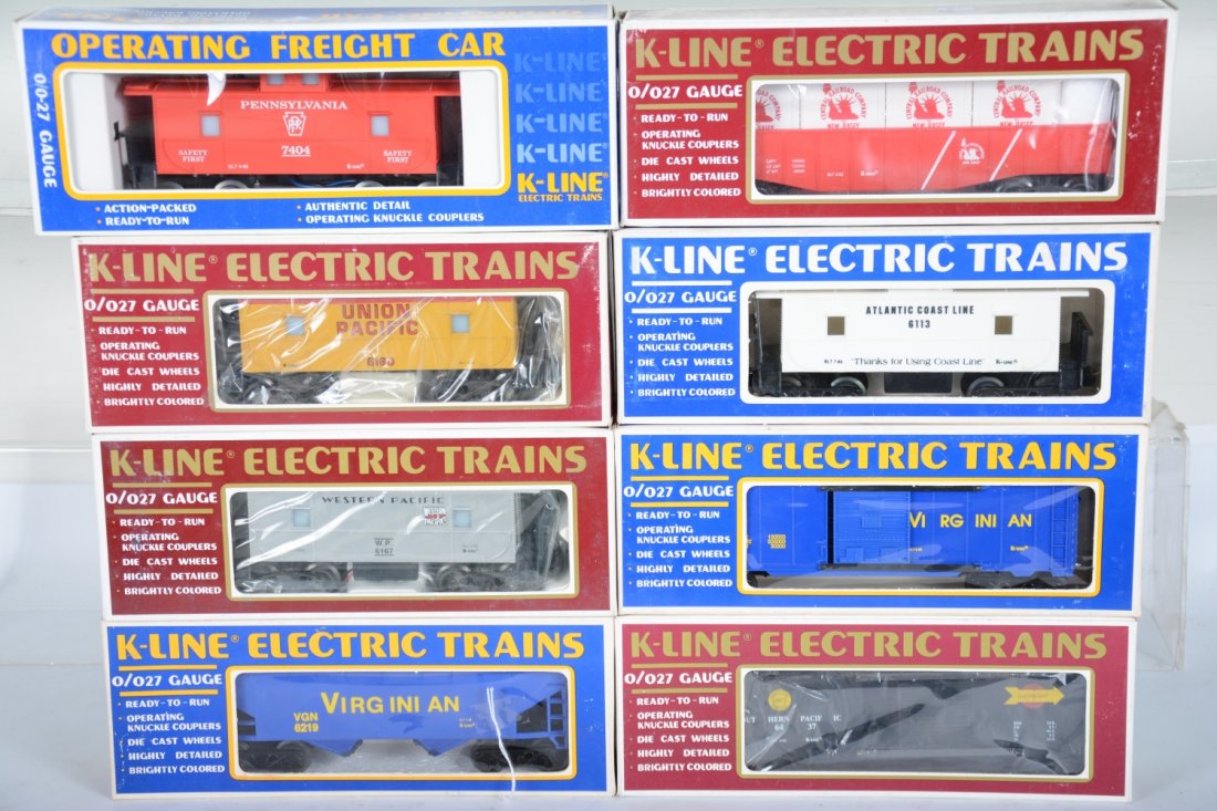K-Line Freight Cars: Includes K9216 Virginian hopper; 7404 PRR smoke caboose; 6160 UP caboose; 6167 WP caboose; 6437 SP boxcar; 6532 CNJ gondola with crates; 6418 Virginian boxcar; 6113 ACL boxcar. All appear new in boxes