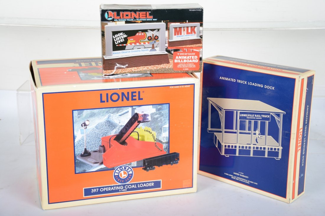 Lionel Accessories: Includes 14004 #397 coal loader; 12929 truck unloading dock; 12809 animated billboard. All appear new in boxes, C9-10