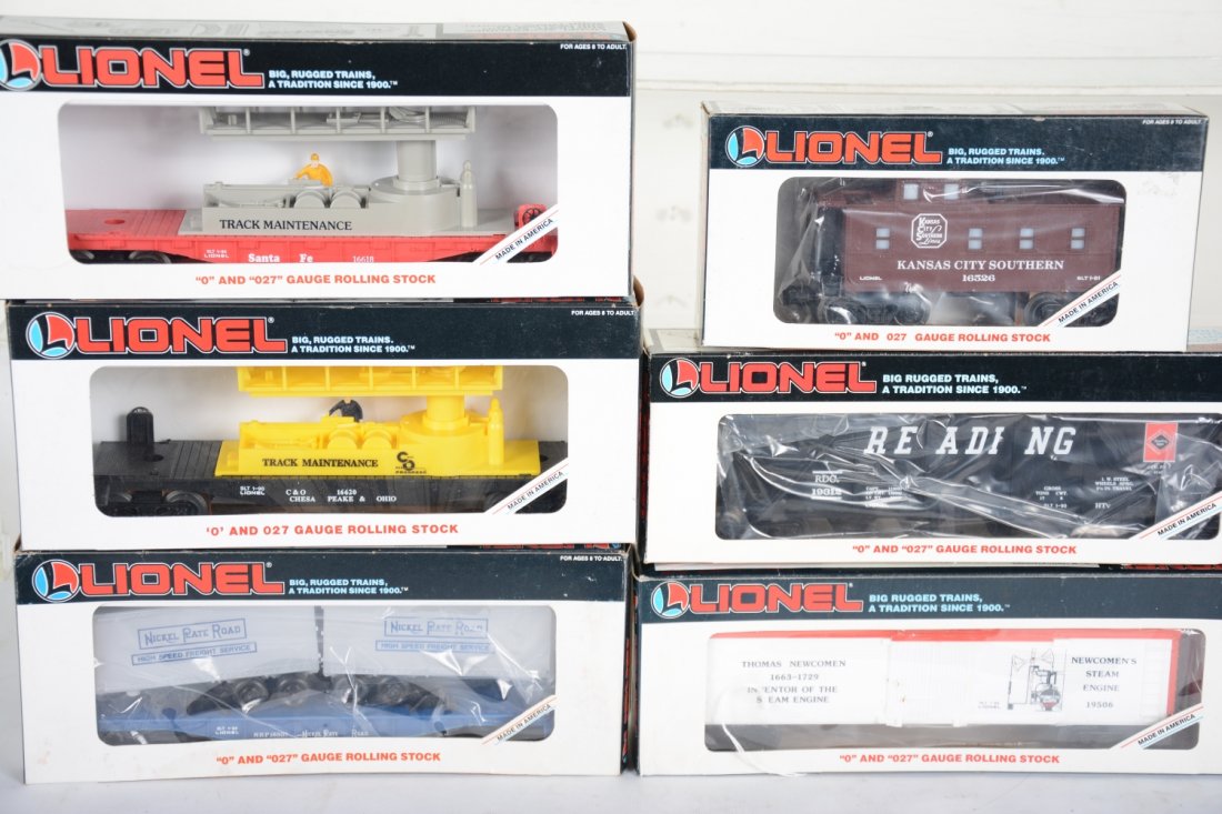 Lionel Freight Cars: Includes 19506 TN reefer; 16307 NPR trailer flat; 19312 Reading hopper; 16618 SF maintenance car; 16620 SF maintenance car; 16526 KCS caboose. All appear new in boxes, C10