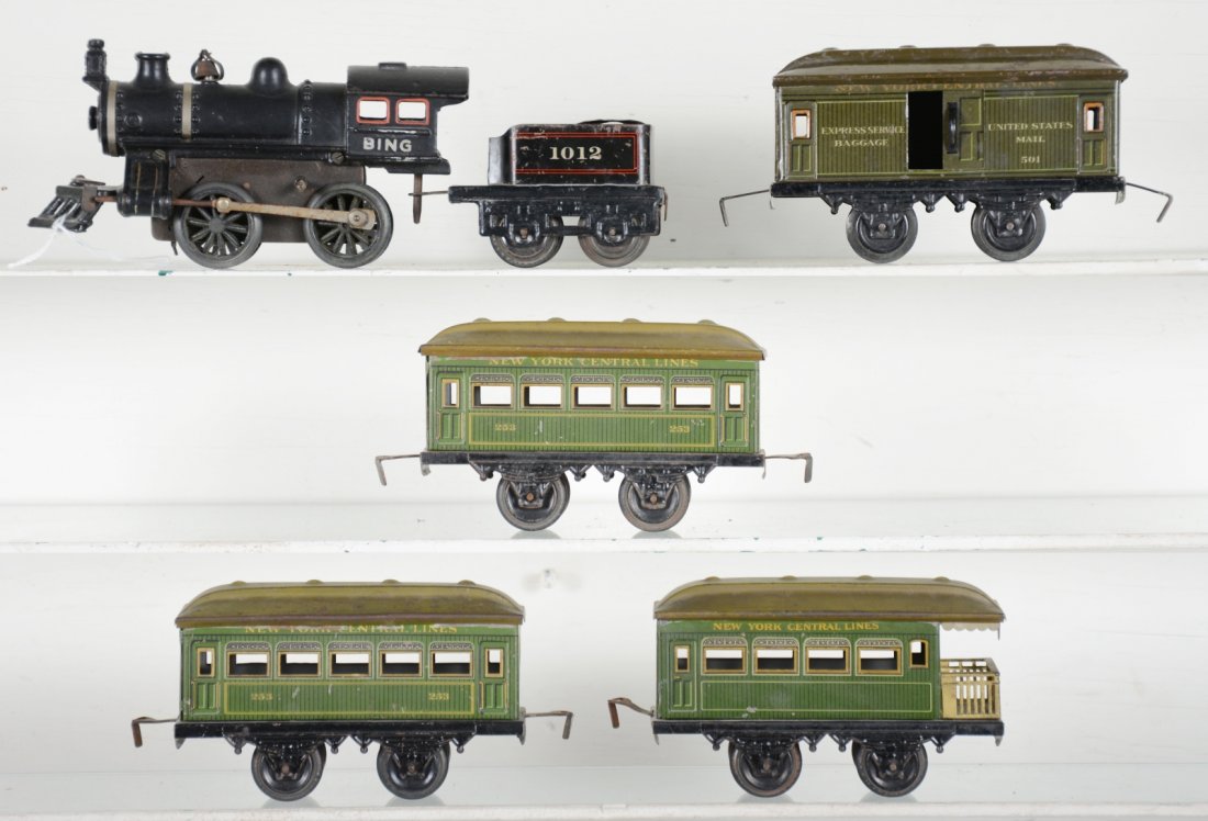 Bing NYC Passenger Set: Includes a Bing steam loco, mechanism's holdback not engaging, light oxidation on rods. 501 baggage; 2 #253 NYC coaches; NYC observation. 3 cars have matching roofs, all show light to moderate playwea