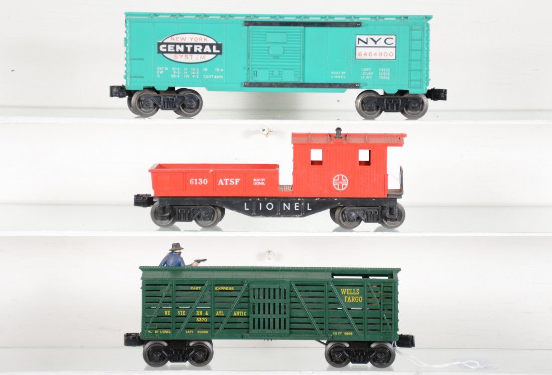 Clean Lionel 6464-900, 3470 & 6130 Freights: Includes a 6464-900 NYC boxcar, type IV on gray mold, unrun, C9; 3470 Sheriff & Outlaw car, figure paint 95%, C8; 6130 SF work caboose, showing light to moderate playwear, C6+
