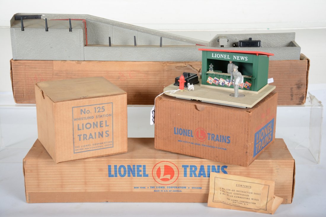 Boxed Lionel Accessory Lot: Includes a 128 animated newsstand, complete with packet, minus newspaper; 125 whistling shack; 364 lumber loader with 364c, no logs; 110 trestle set, version with store display insert, 98% complete. A