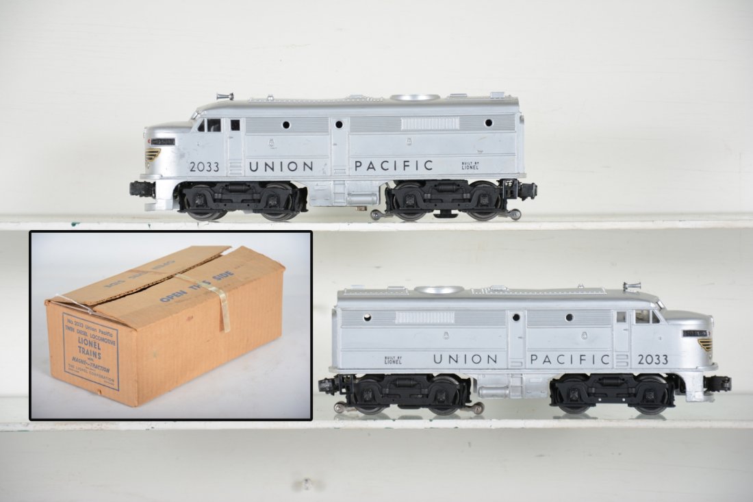 Clean Boxed Lionel 2033 UP Alcos: Bright silver with 96% decals over-all. The battery box is clean and it has a master carton. They show light to moderate playwear, otherwise C7-7+