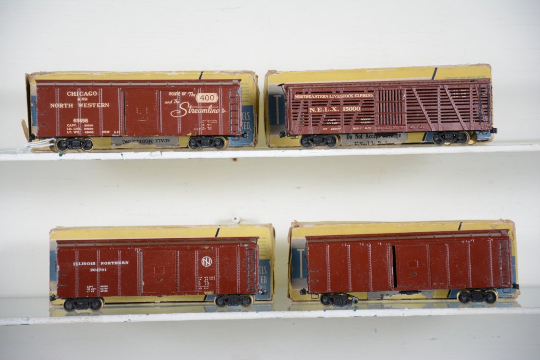 Boxed True Scale OO Freight Cars: Nice American OO. Includes C&NW and IC boxcars; Northern Livestock stock car & non decaled boxcar. All are well painted and include their original boxes. Brass & cast construction, appear C6-7
