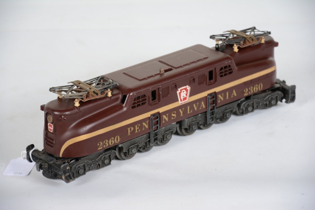 Super Late Lionel 2360 PRR GG1: 1960s production, single stripe with decal lettering. It has beautiful paint & decals showing light run time. The pantographs show light oxidation, otherwise C7+-8 Nice example.