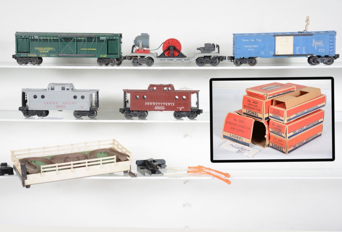 Boxed Lionel Freight Cars: Includes a 6417-50 LV N5c caboose, 6427-1 box; 3650 searchlight extension, missing crank; 3424 brakeman car with -100 telltale set & insert; 3356 horse car with corral & 364c, no horses; 6517 PRR N5c 