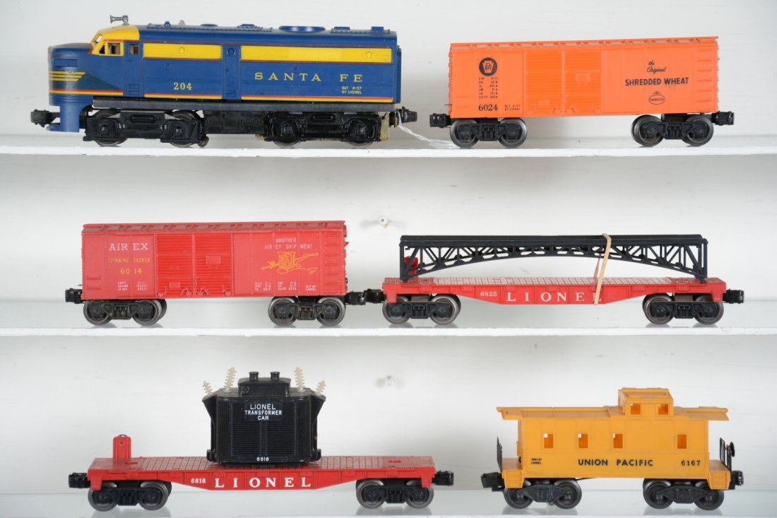 Lionel 204 Diesel Freight Set: Includes a 204 SF Alco A Diesel. Has an intact cowl with just some age cracks to decal; 6024 Shredded Wheat boxcar 6825 flat with bridge; 6014 Airex boxcar; 6818 flat with transformer, 1 insulator is