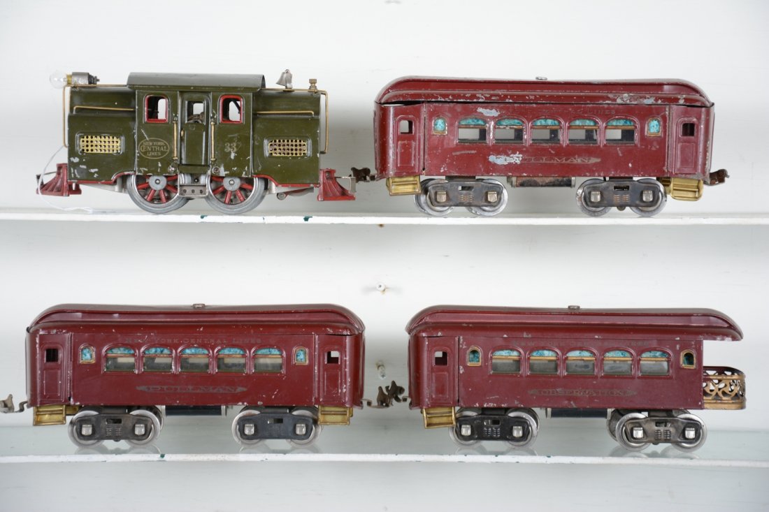 Lionel 33 Passenger Set: Standard Gauge. Includes an 33 center cab electric with nice lettering and split frame; 2 #35 Pullmans; 36 observation, all lettering readable, though some light. Set shows moderate playwear, C5-6