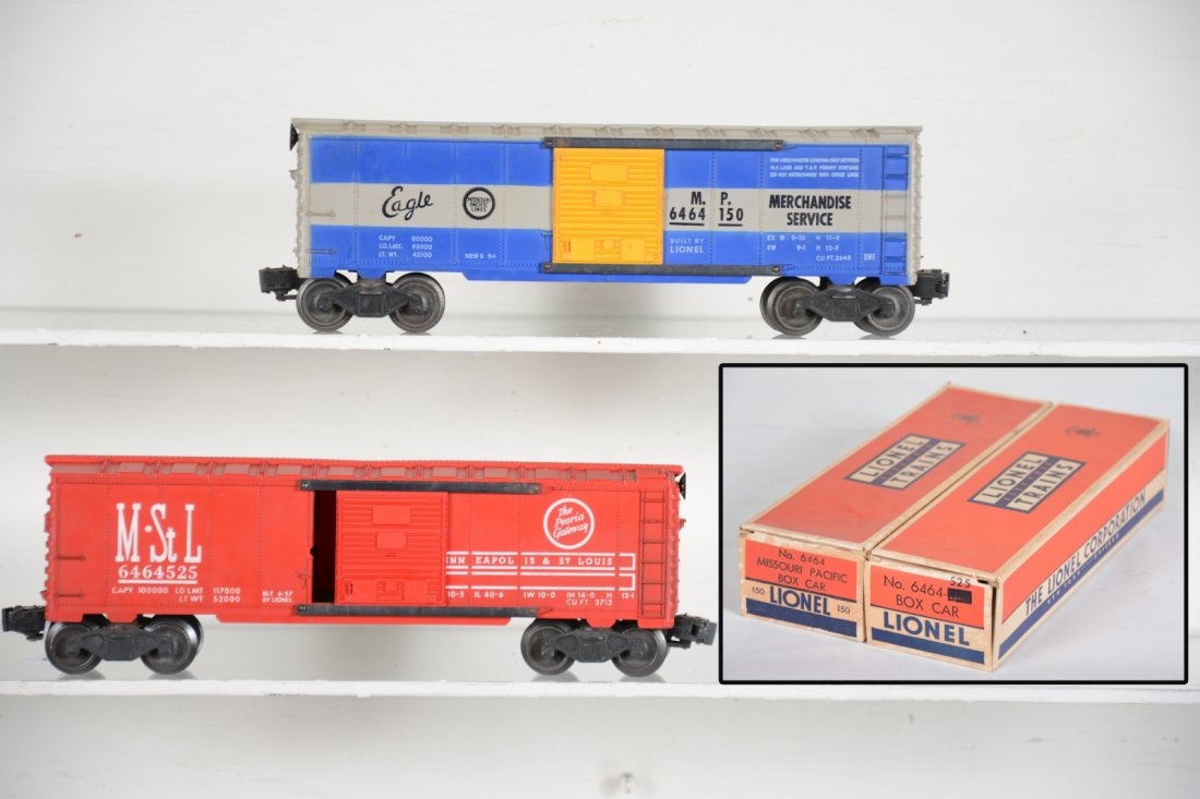 Boxed Lionel 6464-150 & -525 Boxcars: Includes a 6464-150 MP, type IIA, blue painted on gray mold, small Eagle; 6464-525 M&StL, type III. Both show light playwear with boxes, C8