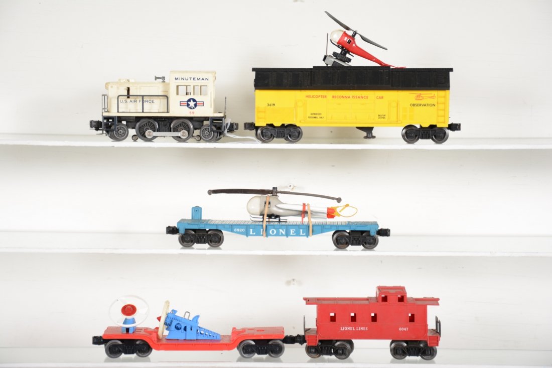 Lionel 59 Diesel Space Set: Includes a 59 minuteman switcher, missing 1 strut; 3349 turbo launcher, 1 repro missile; 3619 Recon helicopter launcher, replaced copter, working; 6820 flat with little Jon copter, replaced missile ra