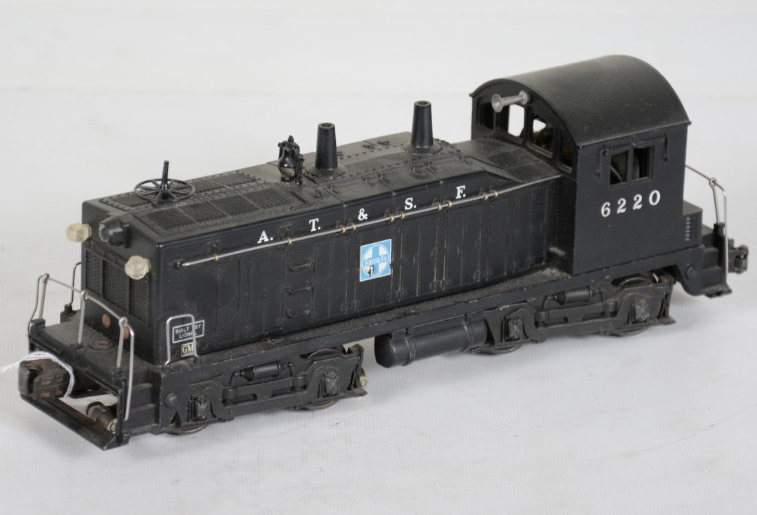 Clean Lionel 6220 SF NW2 Diesel with Bell: Super matte patina with 95% decals; bell mechanism is intact and shows light runtime, C8. Nice example.
