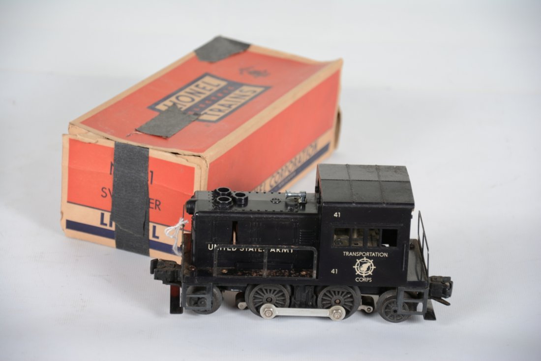 Boxed Lionel 41 Army Diesel: Fairly clean with only 1 hairline cracked strut. It shows light oxidation on handrail, but light runtime with taped box, C6+