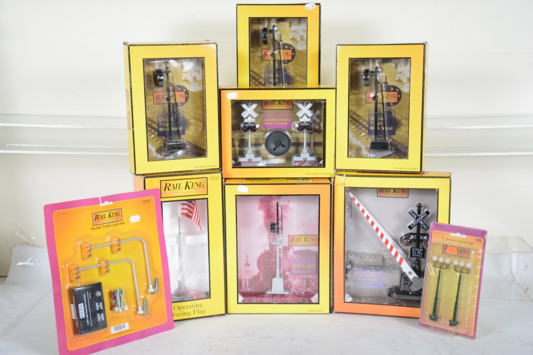 MTH RailKing Scale Accessory Lot: Includes 30-1089-2 double traffic lights; 30-01034 triple lampposts; 30-9103 operating flag pole; 30-1073 crossing gate; 3 #30-11013 Block signals; 30-11014 flasher with sound; 30-1105 block signal. A