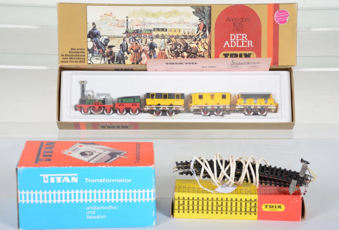 Trix HO Adler Set, Plus: Includes a 1200 5-pc set in display box, lightly run with C9 bodies; Plus 4312 curve track with box and some loose track & a Titan transformer with box.