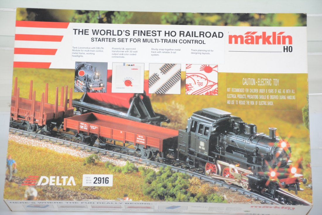 Marklin HO Delta Set 2916: Includes an 0-6-0 tank loco; stake flat; tipple car; open wagon & flat car, track & transformer. It shows light use with C9 bodies and setbox with instructions.