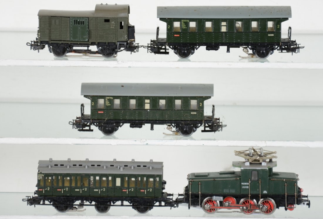 Marklin HO Electric Passenger Set: Includes a 3001 0-6-0 electric loco with 2 #2nd class coaches; 2nd class compartment coach & baggage car, all have lighting kits installed. They show light runtime with C9 bodies.