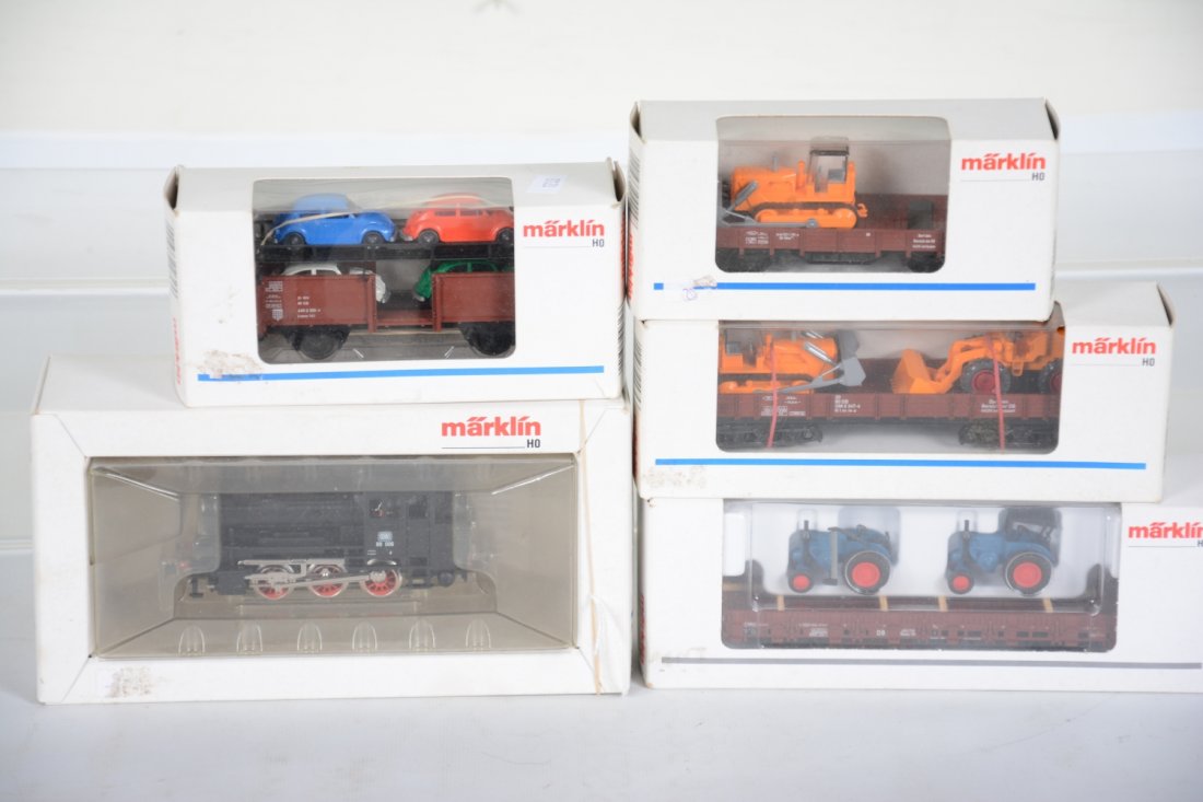 Marklin HO Steam Freight Set: Includes a 3000 0-6-0 tank locomotive; 4424 flat with dozer; 4474 flat with dozer & loader; 46948 flat with tractors; 4613 auto loader with VW Beetles. All show light run time with C9 bodies with boxe