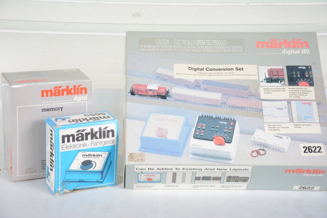 Marklin HO Digital Conversion Set, Plus: Includes a 2622 set with 0-6-0 electric locomotive, controller & junction box with instructions; Plus a 6043 Memory unit; 6699 controller. All show light use with boxes, C8+-9