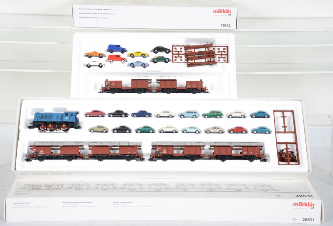Marklin HO Auto Train: Includes a 28631 Set with a V36 0-6-0 diesel with 4 auto-loaders with cars; 46132 Hamo 2-car auto-loader extension set. All show light runtime with C9 bodies and boxes.
