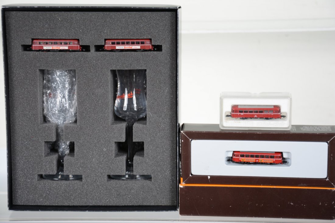 Marklin Z Gauge Railbus Lot: Includes an 88311 Doornkaat Bier power & trail car set with 2 glasses; 8831 Jagermeifler Power car; 8817 DB trail Car. All appear Like New in boxes, C9-10
