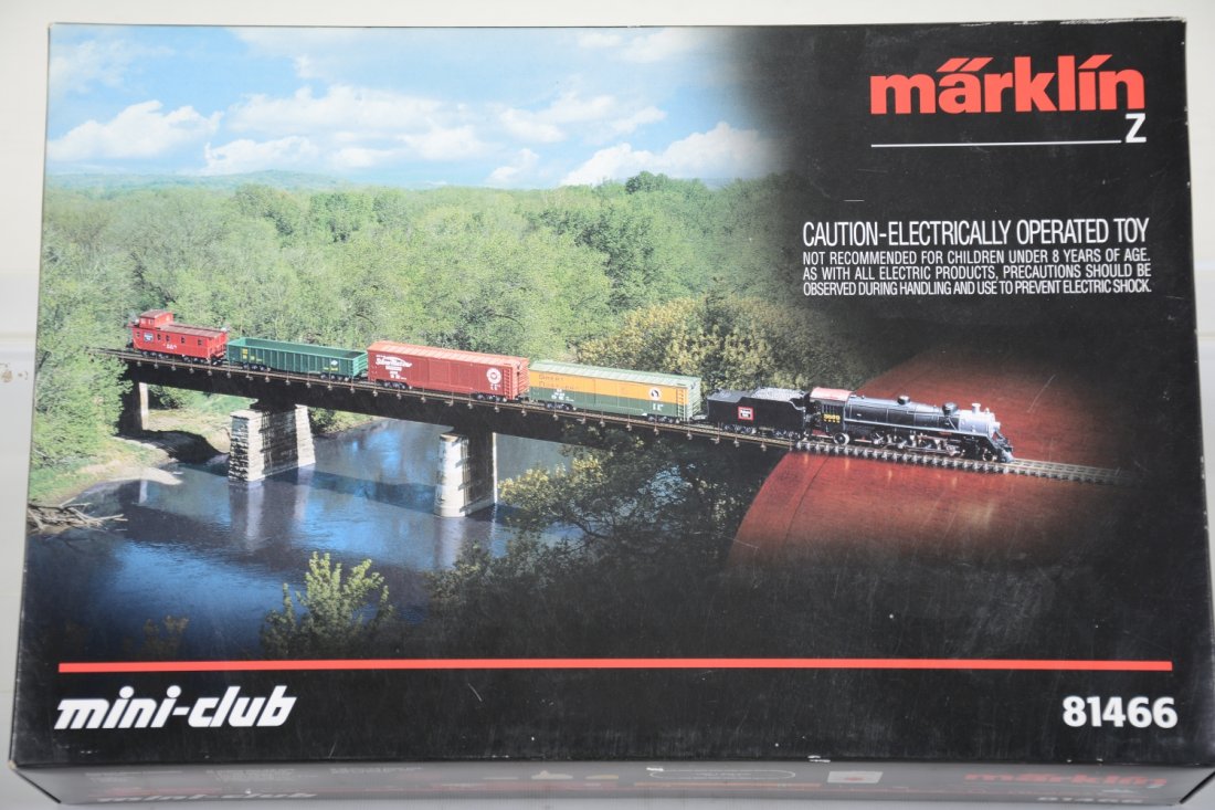 Marklin Z Gauge Set American Set 81466: Includes a CB&Q 2-8-2 Consolidation; Seaboard boxcar; B&O boxcar; C&NW gondola; CB&Q caboose, building, switches, track & transformer with paperwork and setbox. All appear lightly run with C9 bodies.