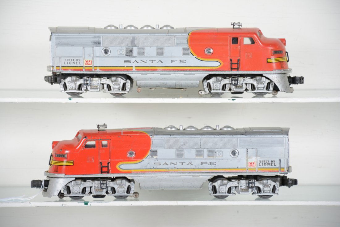 Lionel 2343 SF F3 AA Diesels: Dual motor F3 diesels, showing moderate to heavy playwear with a clean battery box, C5