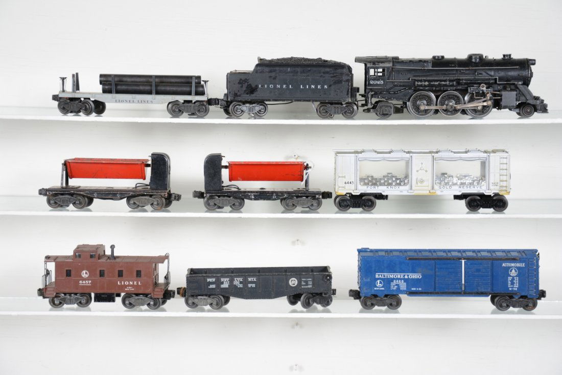Lionel 2025 Steam Freight Set: Includes a 2025 loco, missing running lights, C4; 6466WX tender, cracked shell, C4; 2411 flat with repro pipes; 2 #3559 ore dump cars, 1 is C3; 6468 B&O boxcar, 1 door touched up; 2452 gondola, C4; 64